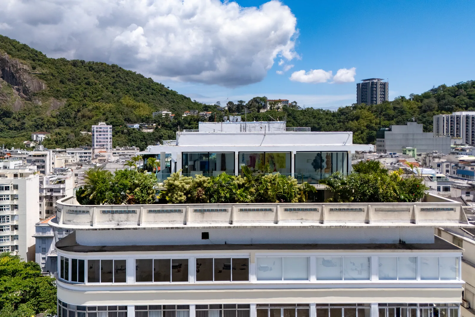 Aerial view of the penthouse and its planted roof above Copacabana