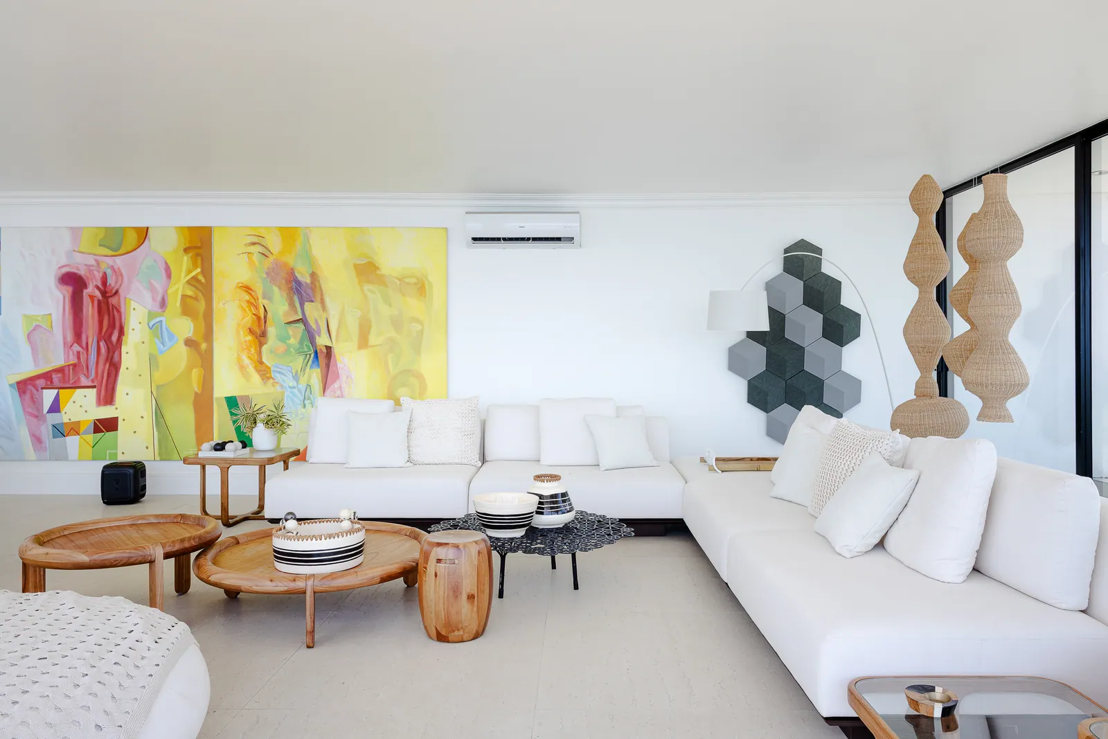Living room with large yellow and pink canvas