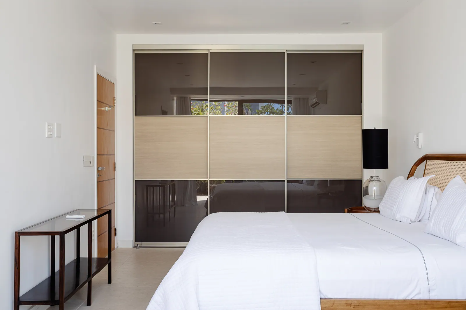 Bedroom with fitted wood wardrobe