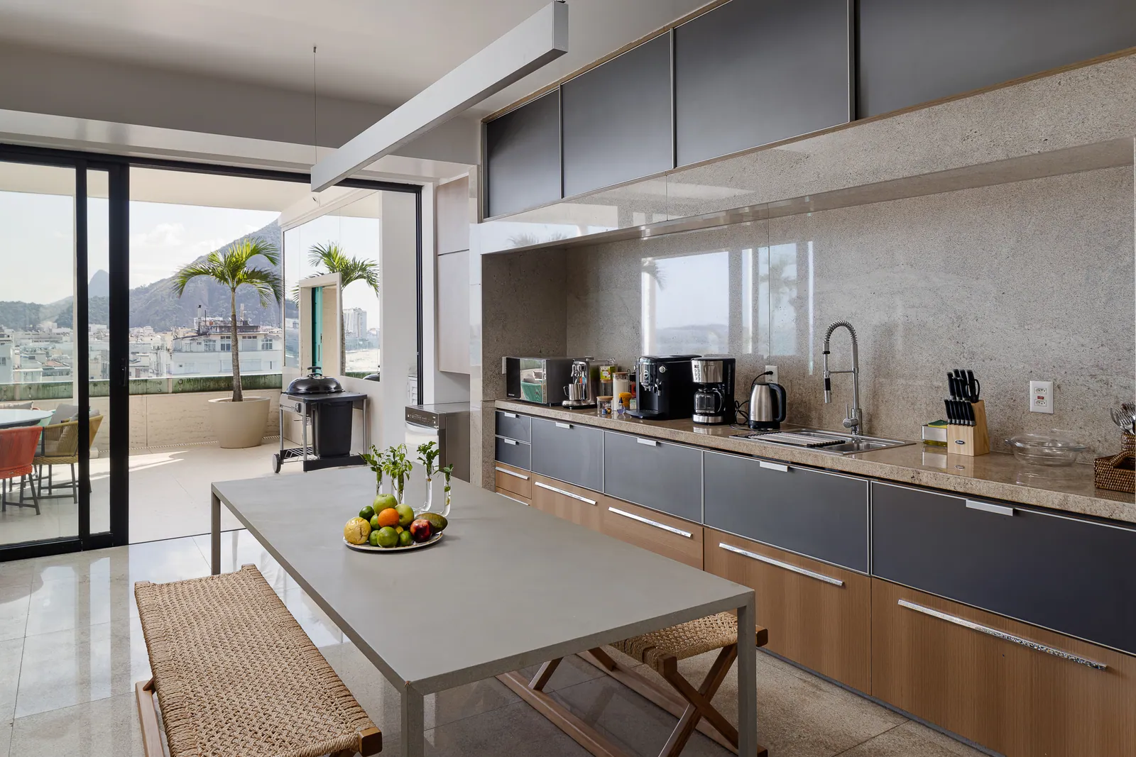 Outdoor kitchen and barbecue with a solid wood counter